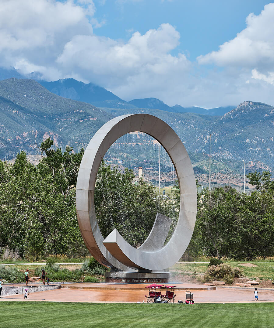 Julie Penrose fountain at foot of mountain range near Park Union